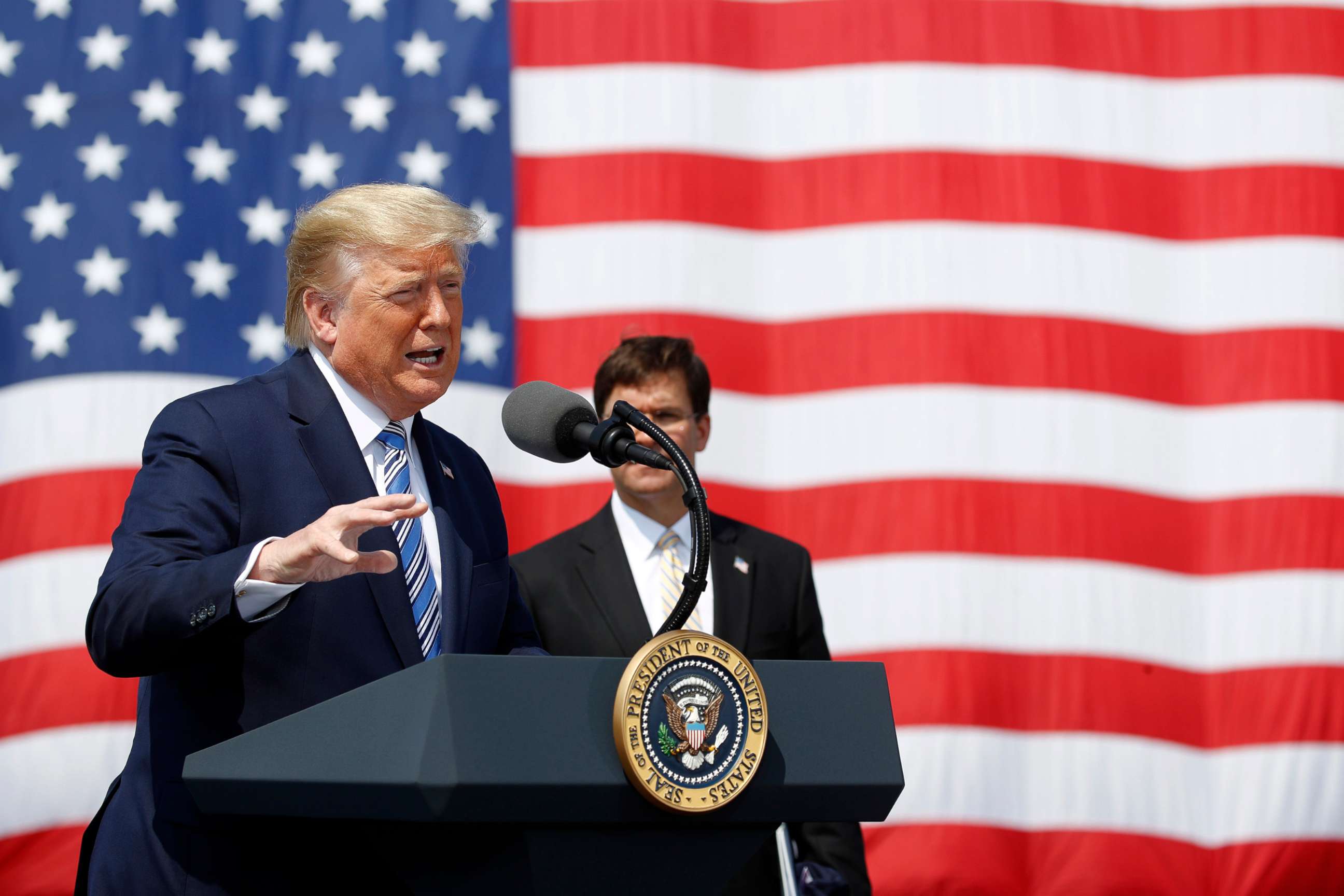 PHOTO:President Donald Trump speaks in front of the USNS Comfort at Naval Station Norfolk, in Norfolk, Va., March 28, 2020.