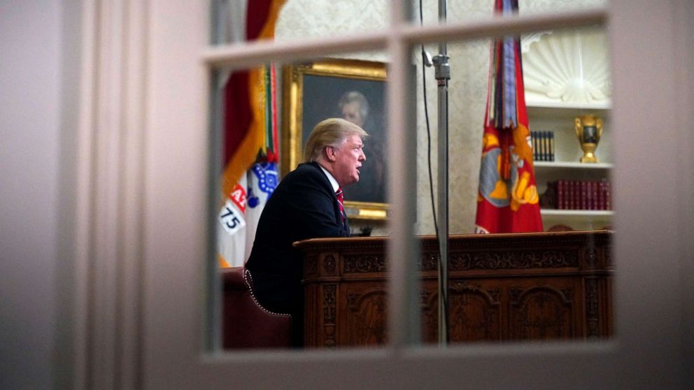 PHOTO: In this Jan. 8, 2018, file photo, President Donald Trump is seen from a window outside the Oval Office at the White House in Washington, D.C.