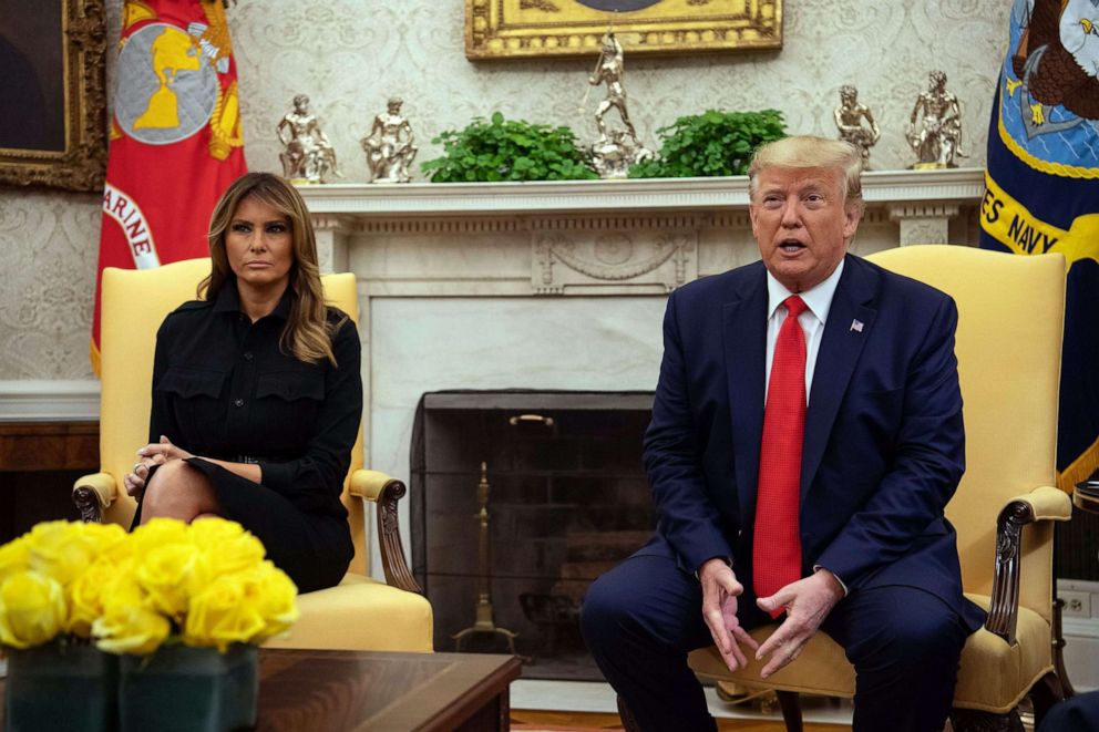 PHOTO: President Donald Trump, with First Lady Melania Trump, speaks to the press in the Oval Office at the White House in Washington, D.C., on September 11, 2019.