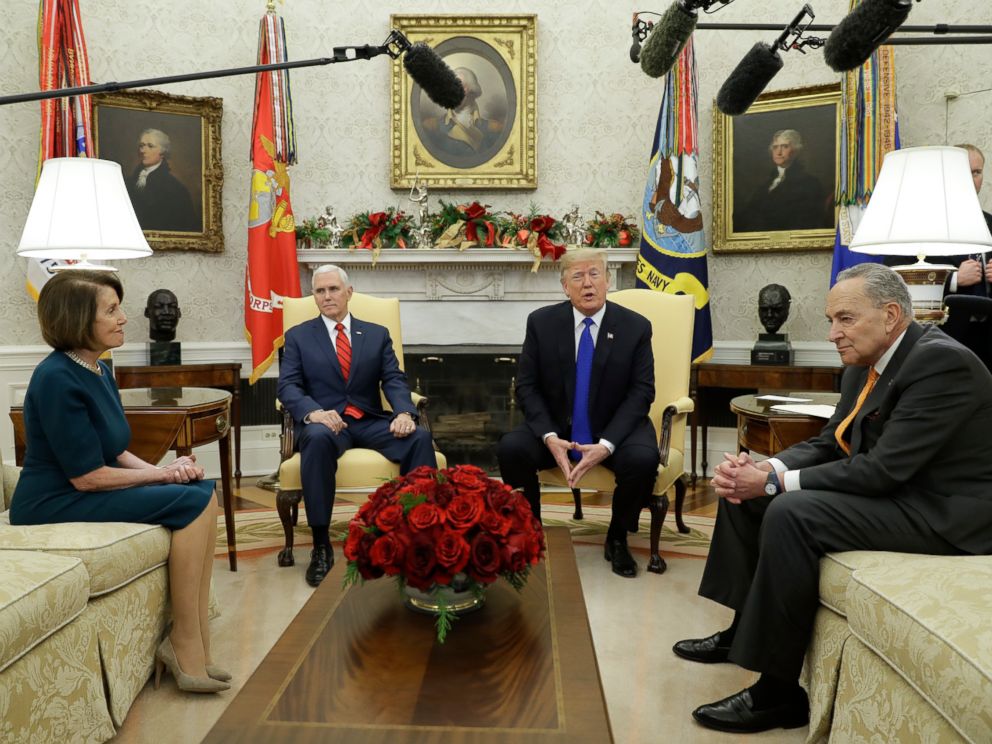 PHOTO: President Donald Trump and Vice President Mike Pence meet with Senate Minority Leader Chuck Schumer and House Minority Leader Nancy Pelosi in the Oval Office of the White House, Dec. 11, 2018, in Washington.