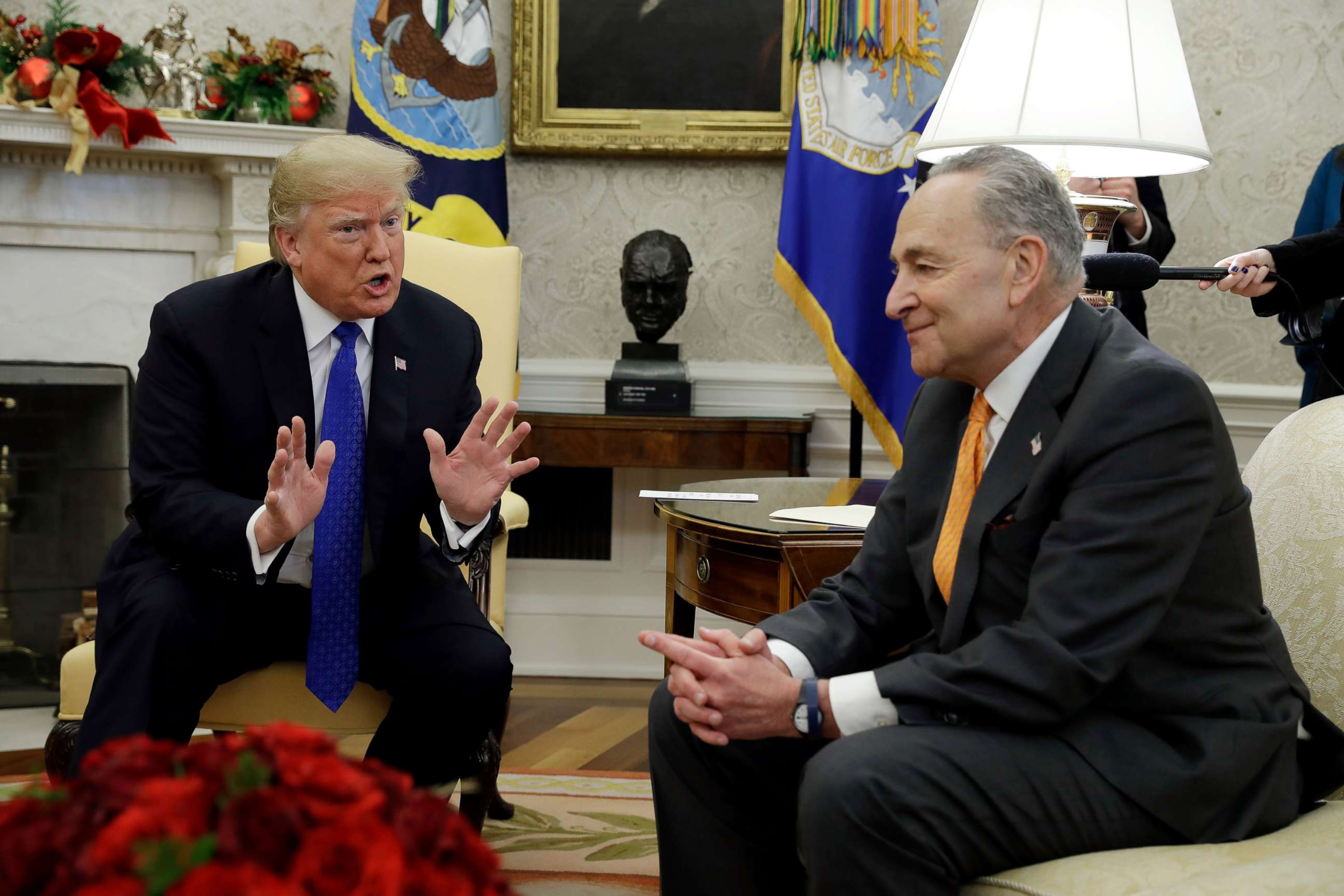 PHOTO: President Donald Trump meets with Senate Minority Leader Chuck Schumer and House Minority Leader Nancy Pelosi, not shown, in the Oval Office of the White House, Dec. 11, 2018, in Washington.