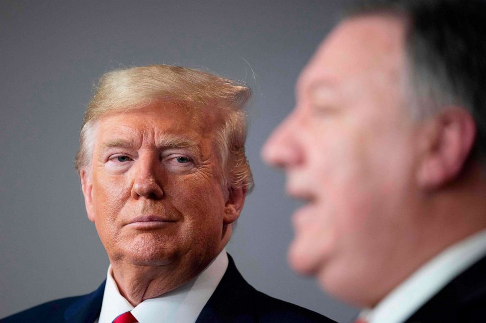 PHOTO: President Donald Trump listens as Secretary of State Mike Pompeo speaks during the daily briefing on the novel coronavirus at the White House, on March 20, 2020, in Washington.