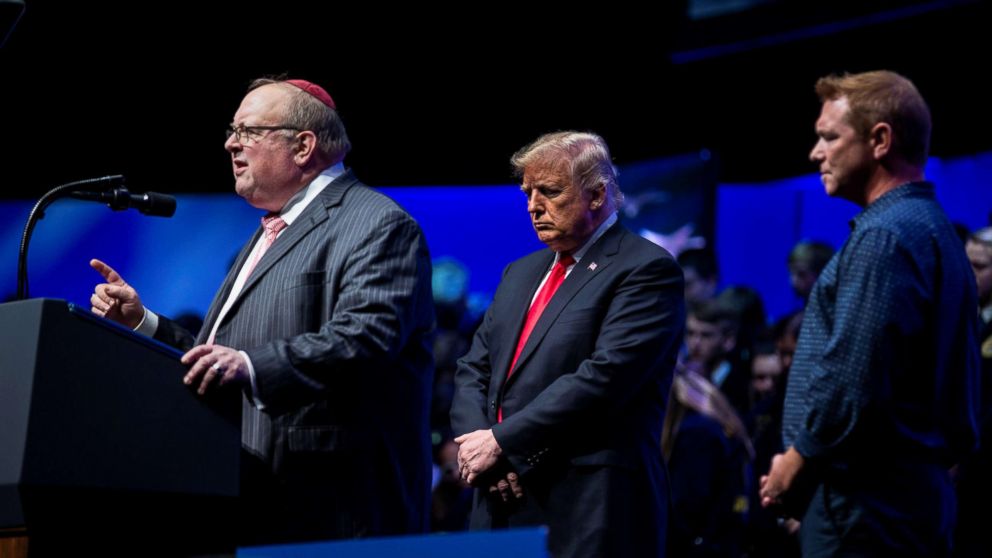 Rabbi Benjamin Sendrow leads a prayer alongside President Donald Trump and Pastor Thom O'Leary, at the 91st Annual Future Farmers of America Convention and Expo, in Indianapolis, Indiana.