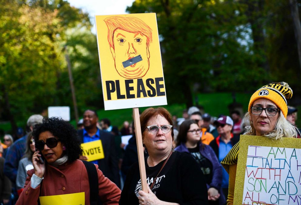 PHOTO: People protesting against President Donald Trump wait near the Tree of Life Congregation on Oct. 30, 2018 in Pittsburgh.