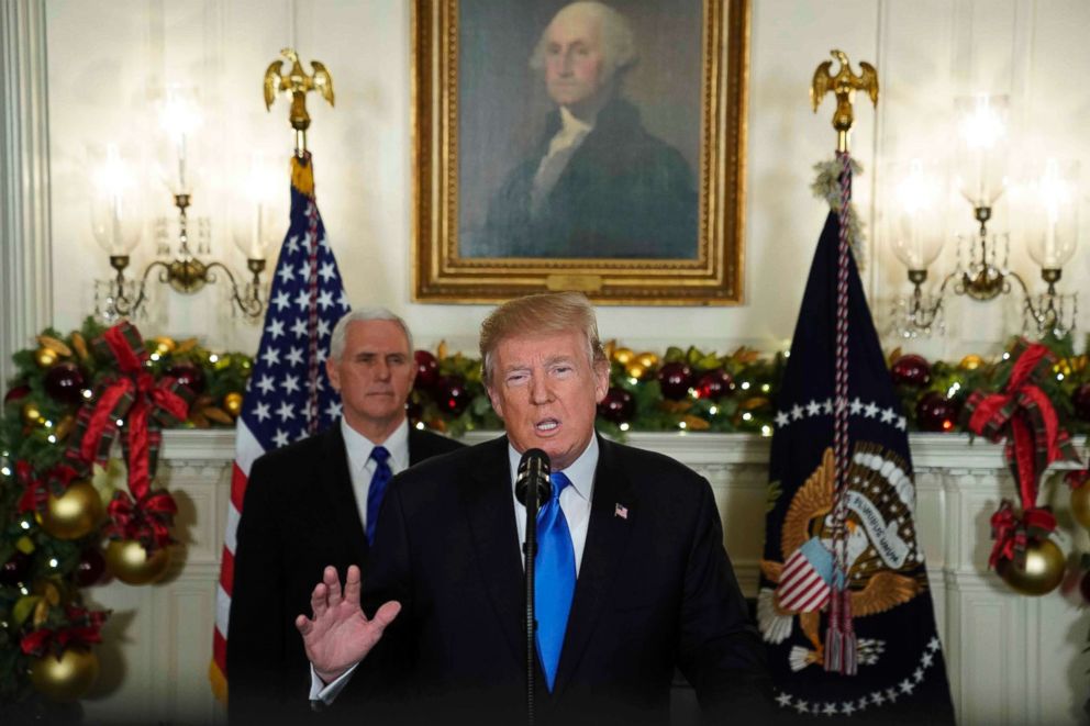 PHOTO: President Donald Trump gives a statement on Jerusalem, during which he recognized Jerusalem as the capital of Israel, as he appears with Vice President Mike Pence in the Diplomatic Reception Room of the White House, Dec. 6, 2017.