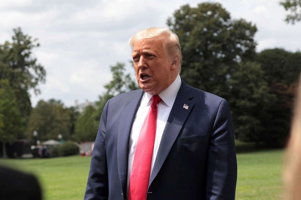 PHOTO: President Donald Trump speaks to the media before departing on Marine One for travel to Cleveland, Ohio, to deliver remarks on Economic Prosperity, from the South Lawn of the White House,, Aug. 6, 2020. 