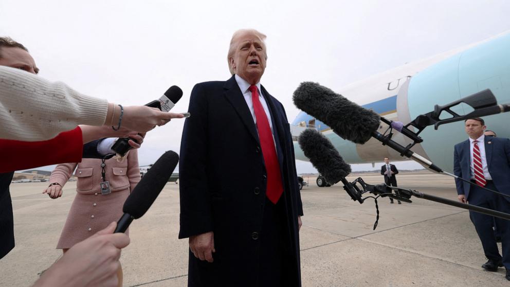 PHOTO: President Donald Trump speaks to reporters before boarding Air Force One as he departs from Joint Base Andrews in Maryland, March 14, 2025.