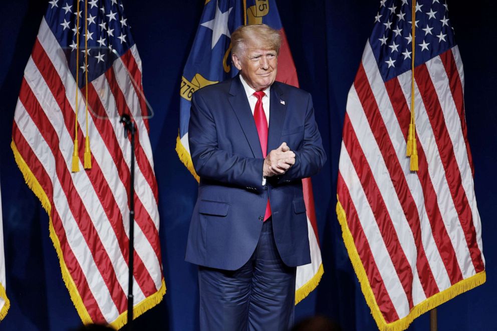 PHOTO: Former President Donald Trump stands on stage during an appearance at the North Carolina GOP convention dinner in Greenville, N.C., June 5, 2021.