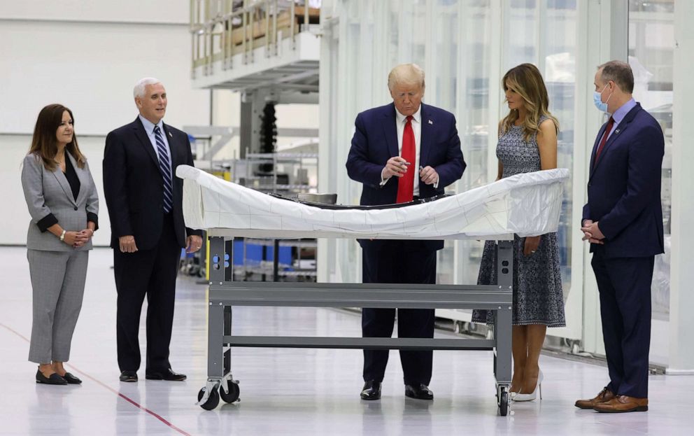 PHOTO: President Donald Trump signs his name during a tour with Vice President Mike Pence, Karen Pence and first lady Melania Trump, at the Neil Armstrong Operations and Checkout Facility at the Kennedy Space Center in Cape Canaveral, Fla., May 27, 2020.