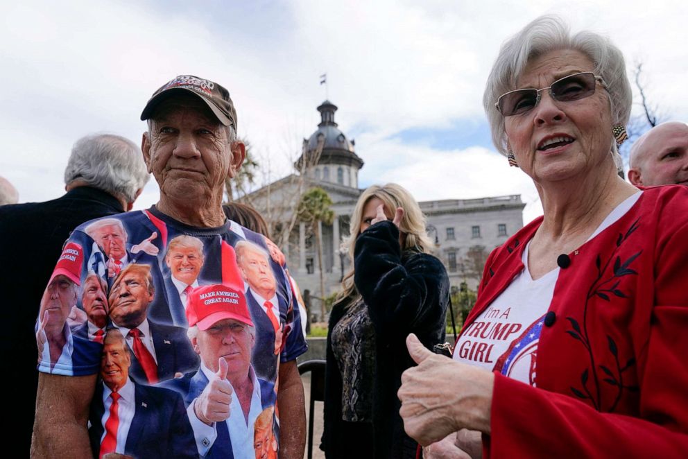 PHOTO: Bob Roach of Columbia, S.C., left, and his sister Carolyn Church, of Lexington, stand outside the South Carolina Statehouse as they arrive to attend a campaign event for former President Donald Trump, on Jan. 28, 2023, in Columbia, S.C.