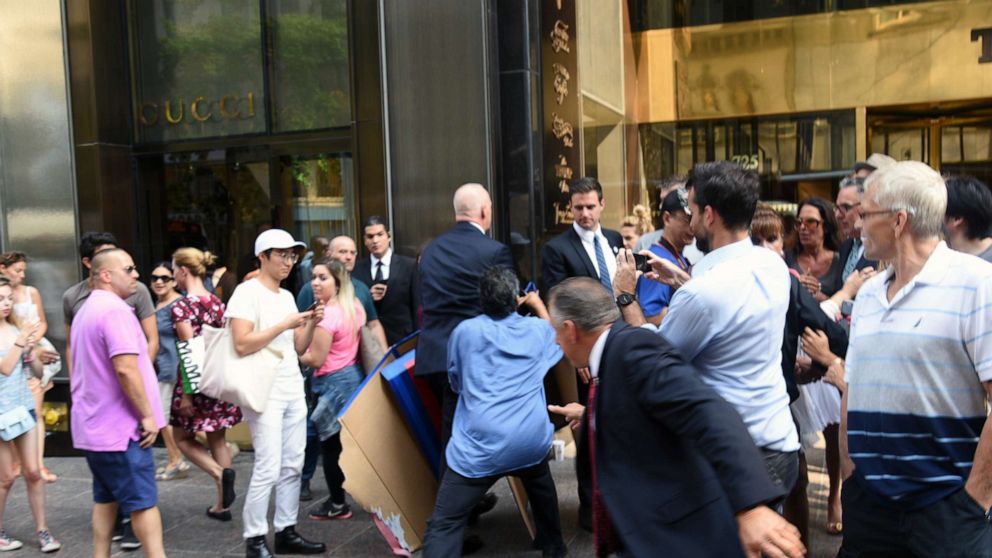 PHOTO: In this Sep. 3, 2015 file photo Trump's director of security and longtime bodyguard Keith Schiller with demonstrator Efrain Galicia (blue shirt) at Trump Tower, New York.