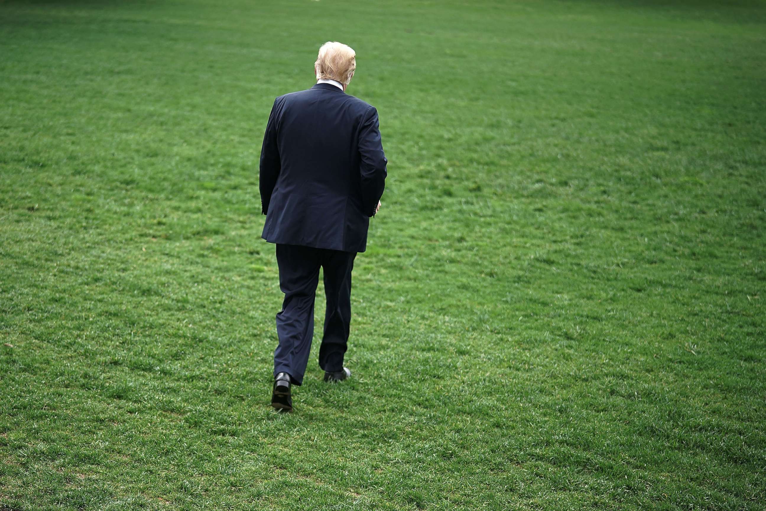 PHOTO: President Donald Trump walks on the South Lawn of the White House, May 4, 2018 in Washington, D.C.