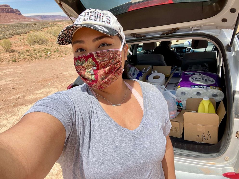 PHOTO: Shandiin Herrera pictured with supplies during a drop-off for Navajo & Hopi Families COVID Relief.