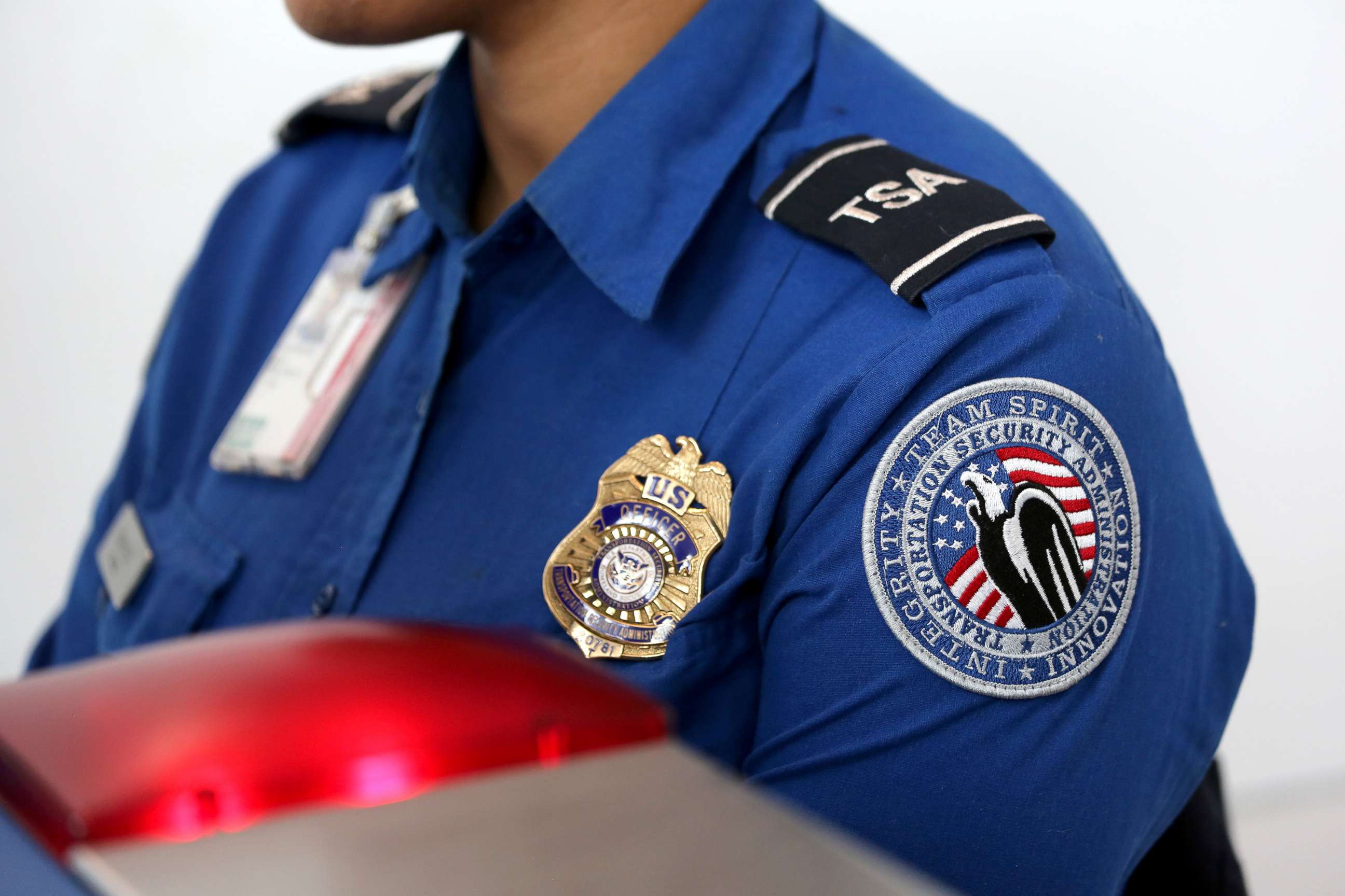 PHOTO: Transportation Security Administration (TSA) agents work at a check-point inside LaGuardia airport in New York, Jan. 27, 2014.
