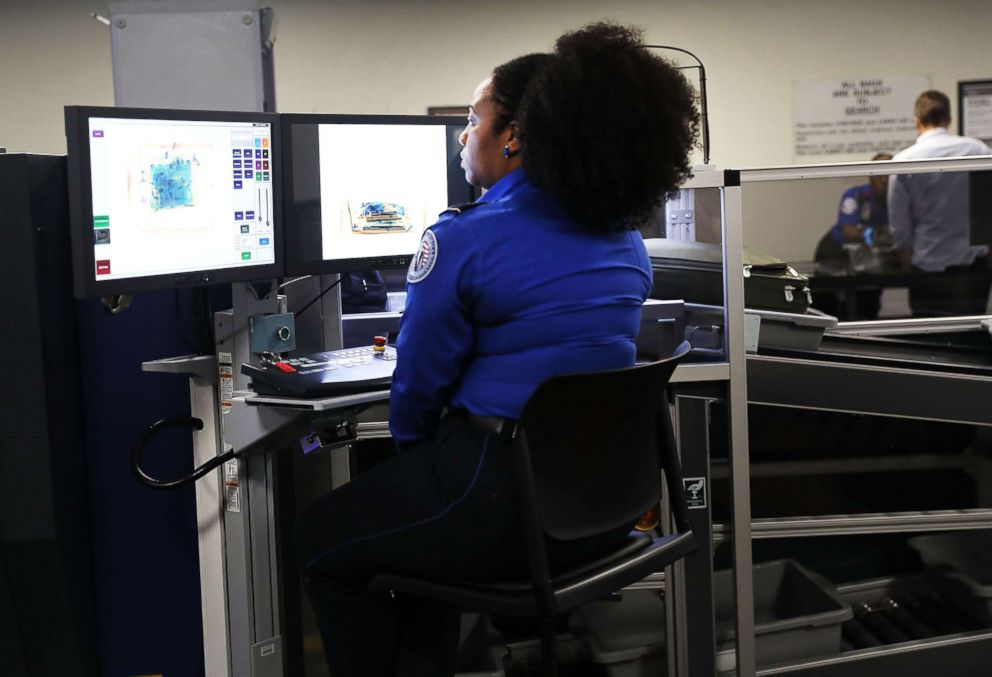 PHOTO: A Transportation Security Administration (TSA) worker screens luggage at LaGuardia Airport (LGA) on Sept. 26, 2017 in New York City.