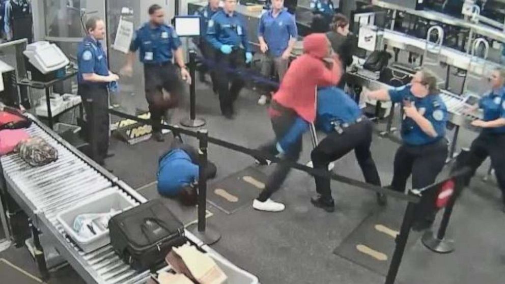 PHOTO: A 19-year-old man is seen in surveillance footage fighting a group of TSA agents at Phoenix Sky Harbor International Airport on Tuesday, June 18.