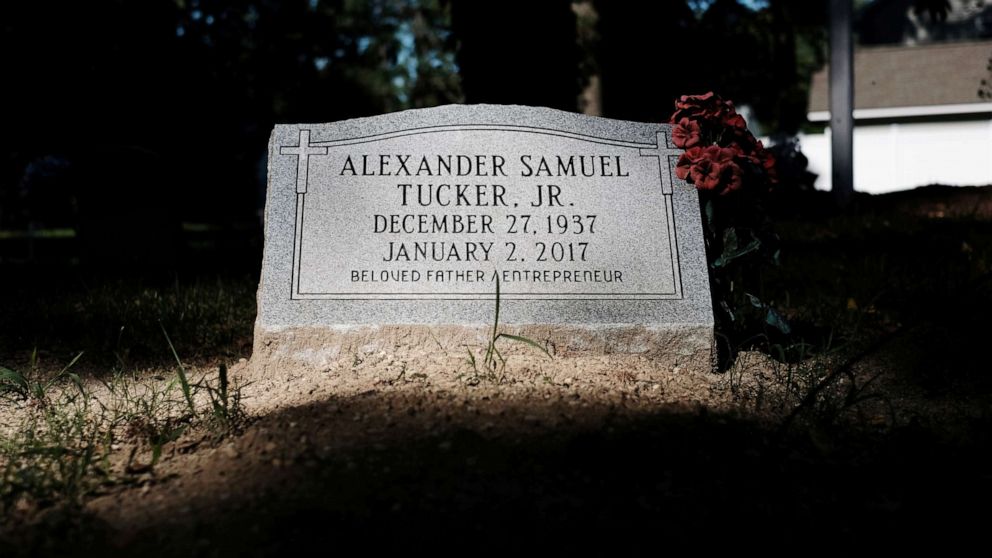 PHOTO: A flower lays on a grave in the Tucker family cemetery in Hampton, Virginia, July 27, 2019.