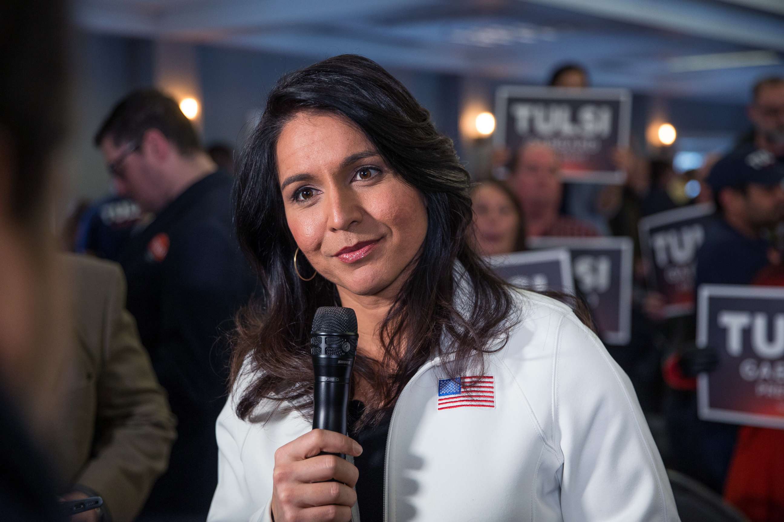 PHOTO: Rep. Tulsi Gabbard answers media questions following a campaign event on Feb. 9, 2020, in Portsmouth, N.H. 
