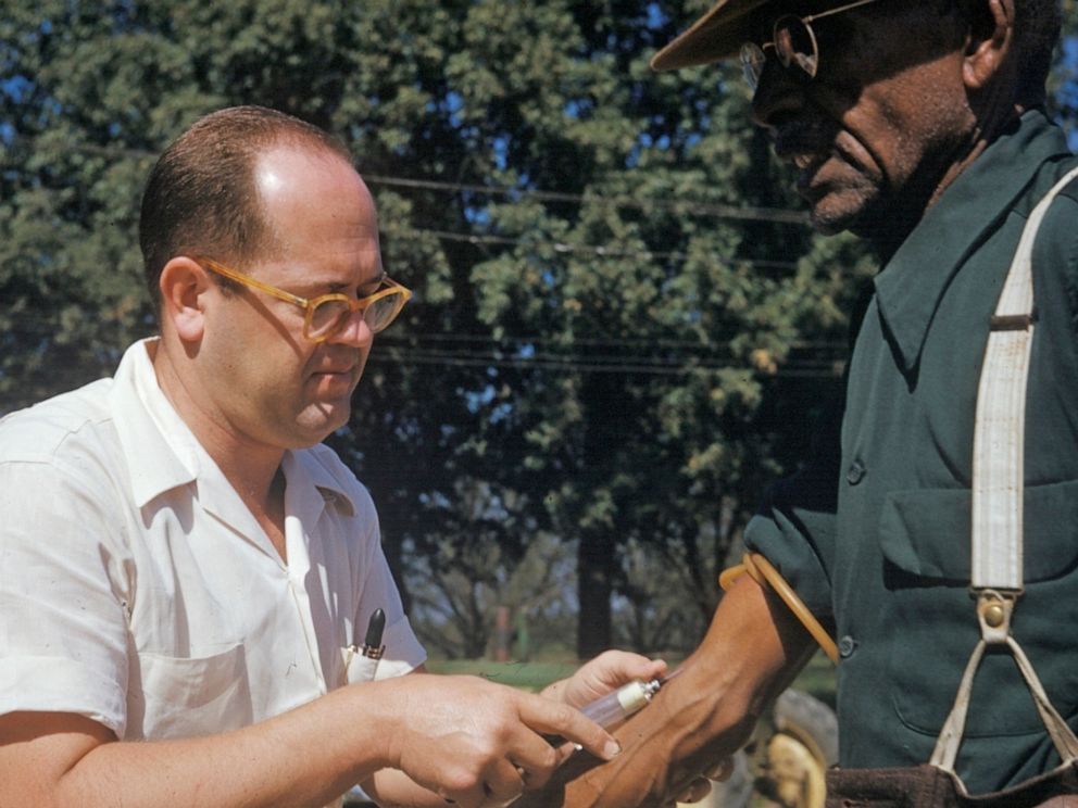 PHOTO: A black man has blood drawn by a doctor during a syphilis in Tuskegee, Ala. in this 1950's file photo released by the National Archives.