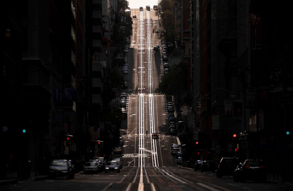PHOTO: A street in San Francisco, usually filled with cable cars and people, is nearly empty, March 18, 2020, during the coronavirus outbreak.