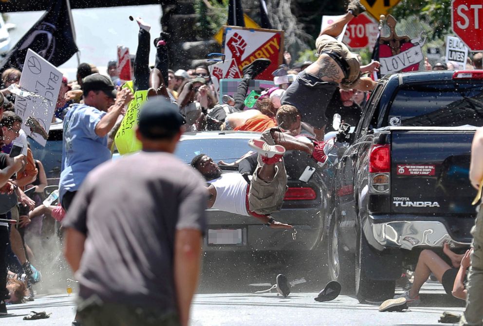 PHOTO: People fly into the air as a vehicle drives into a group of protesters demonstrating against a white nationalist rally in Charlottesville, Va., Aug. 12, 2017. 