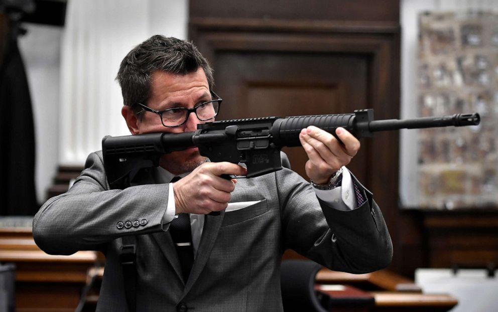 PHOTO: Assistant District Attorney Thomas Binger holds Kyle Rittenhouse's gun as he gives the state's closing argument in the trial at the Kenosha County Courthouse on Nov. 15, 2021, in Kenosha, Wis.