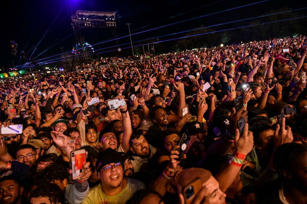 PHOTO: The crowd watches as Travis Scott performs at the Astroworld Festival at NRG Park on Nov. 5, 2021, in Houston. 