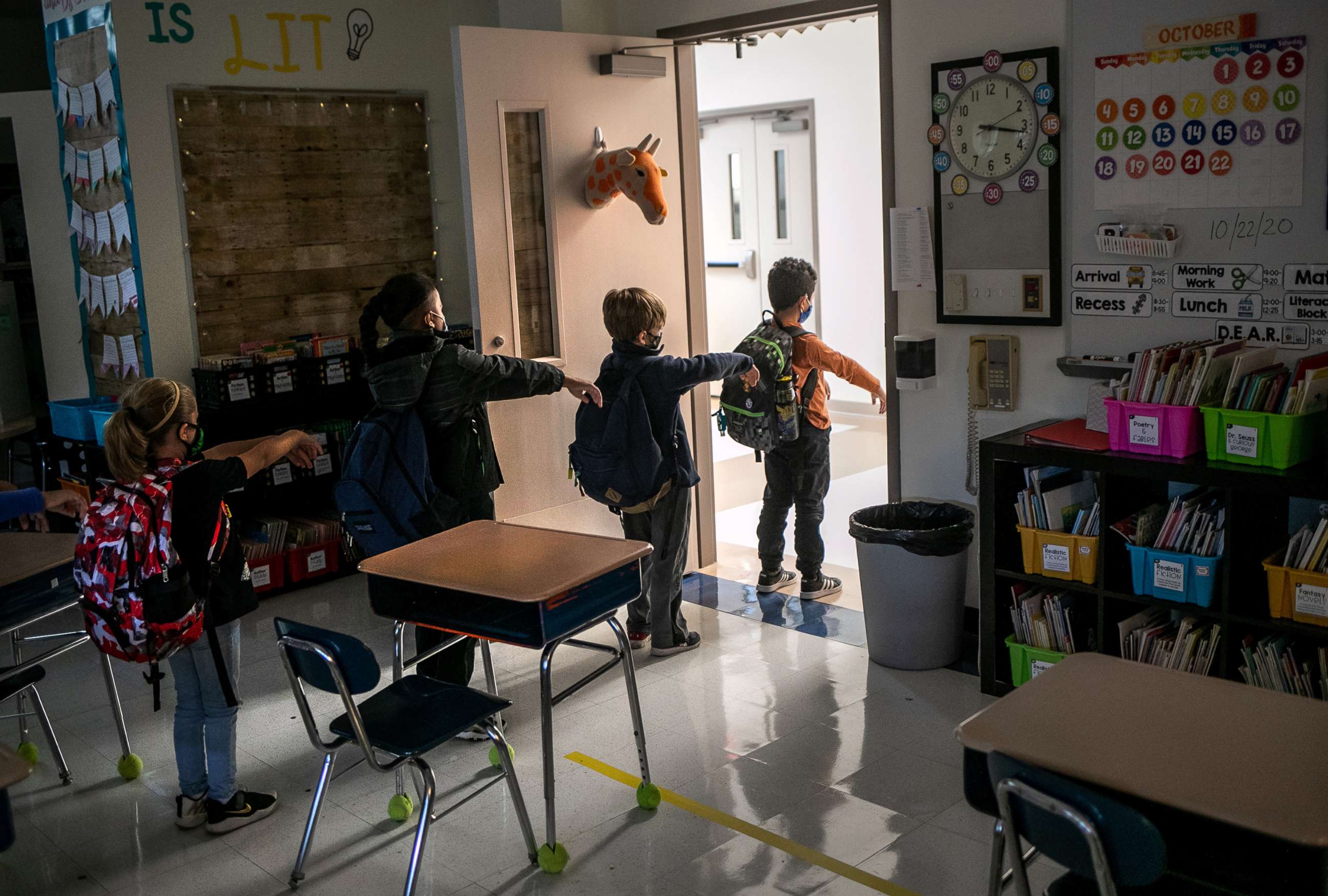 PHOTO: A kindergarten class socially distances while preparing to leave their classroom at Stark Elementary School, Oct. 21, 2020, in Stamford, Conn.