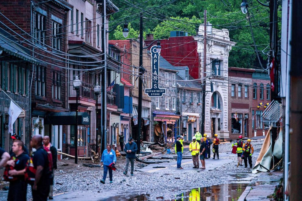 PHOTO: Rescue personnel examine damage on Main Street after a flash flood rushed through the historic town of Ellicott City, Maryland, May 27, 2018. The National Weather Service stated as much as 9.5 inches of rain fell in the area.