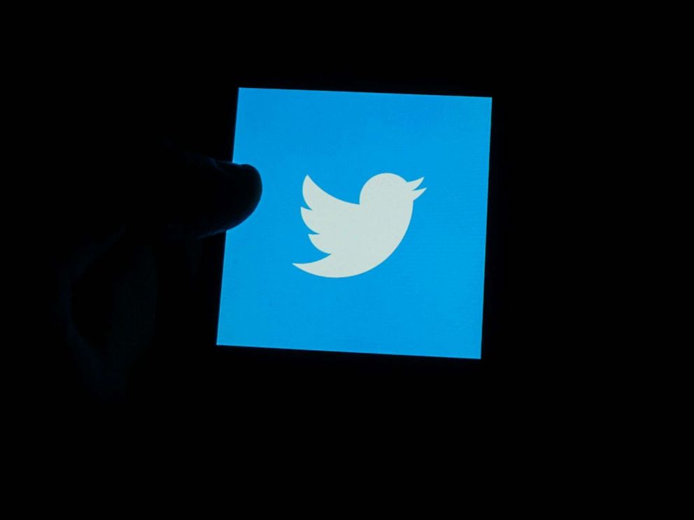 PHOTO: The Twitter logo is displayed on a smartphone screen in an undated photo illustration.