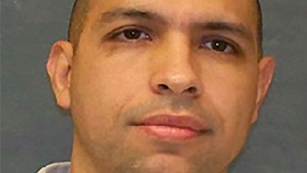 Escaped inmate dies in police shootout after allegedly murdering family of 5