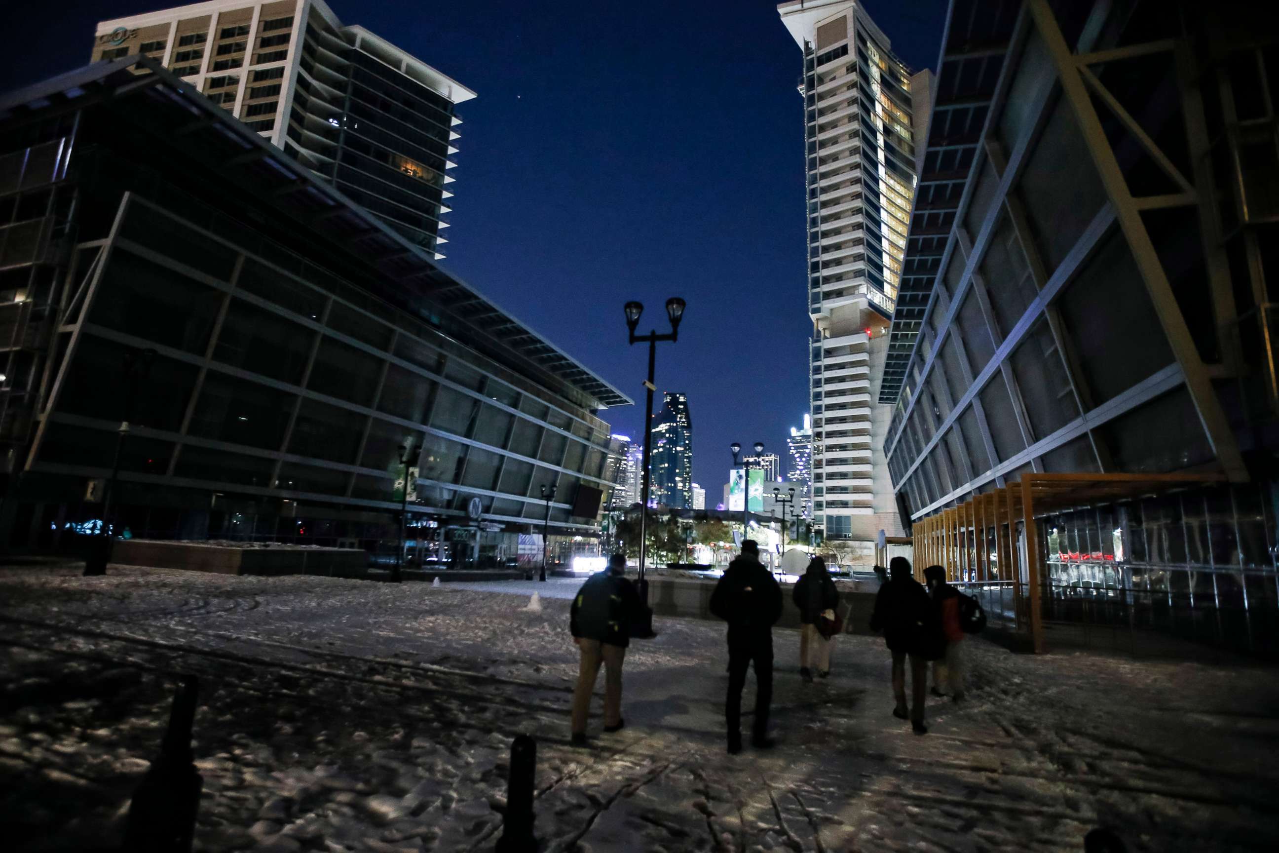 PHOTO: Due to a shortage of electricity in the region, the lights and screens in front of American Airlines Center are turned off on Feb. 15, 2021, saving electricity resources in Dallas. 