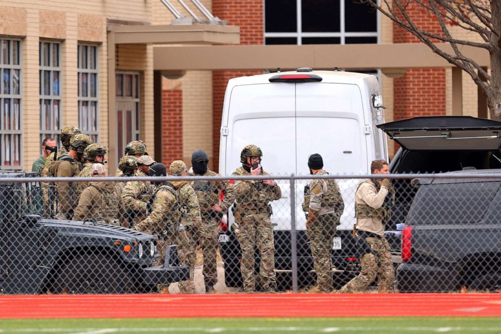 PHOTO: SWAT team members deploy near the Congregation Beth Israel Synagogue in Colleyville, Texas, some 25 miles, on Jan. 15, 2022. A man claiming to be the brother of a convicted terrorist took several people hostage, police and media said.