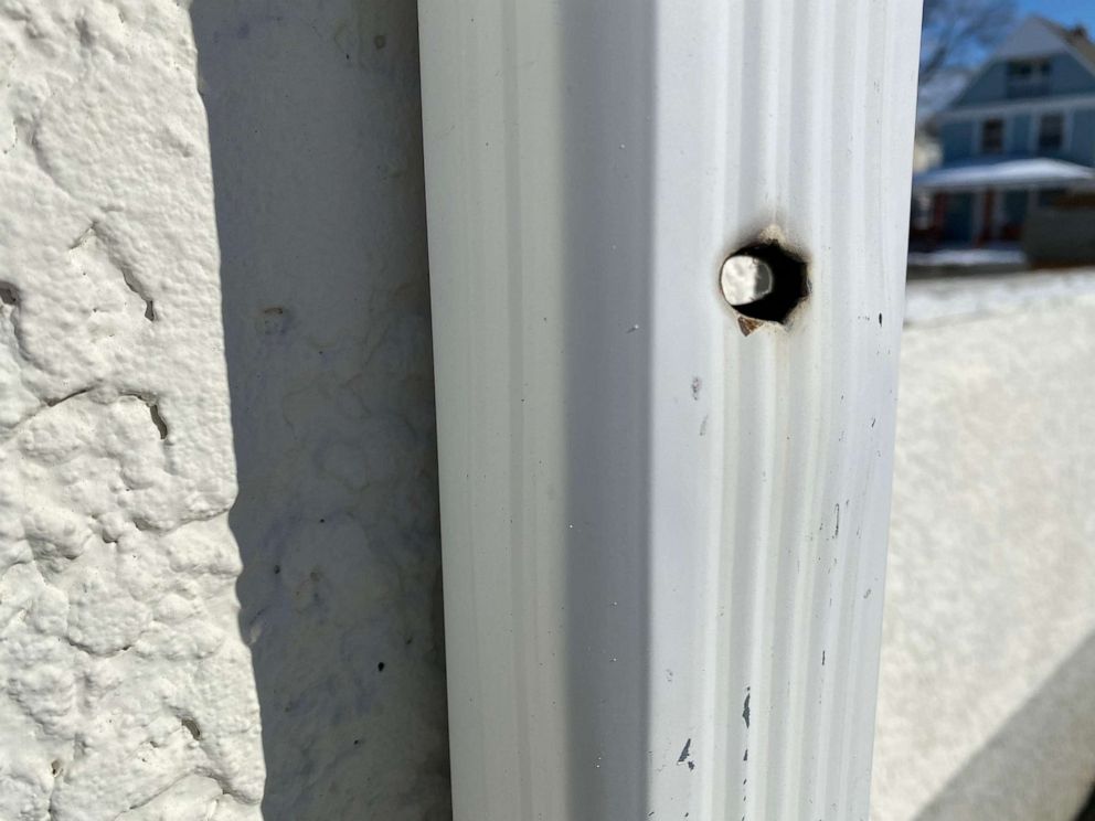 PHOTO: A rusted bullet hole is visible in a rain gutter downspout across the street from where 11-year-old Tyesha Edwards was struck and killed by a stray bullet while sitting at her dining room table in 2002 in Minneapolis.