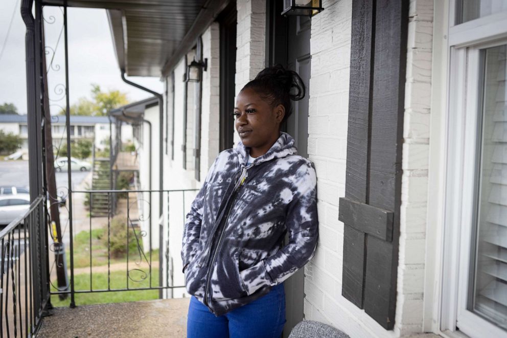 PHOTO: Tykirel Jordan stands outside of her apartment where she lives with her daughter in late October in Birmingham, Ala.