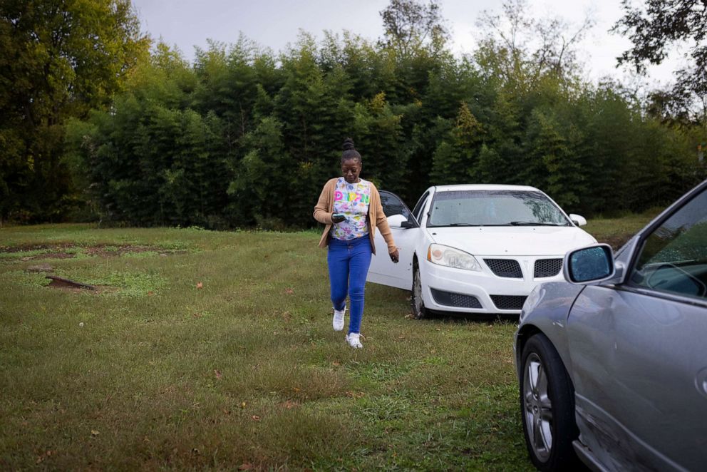 PHOTO: Tykirel Jordan walks to her car after holding a dance practice at Youth Towers, Oct. 28, 2021, in Birmingham, Ala. Youth Towers helped Jordan secure her apartment through a program of gradual responsibility.