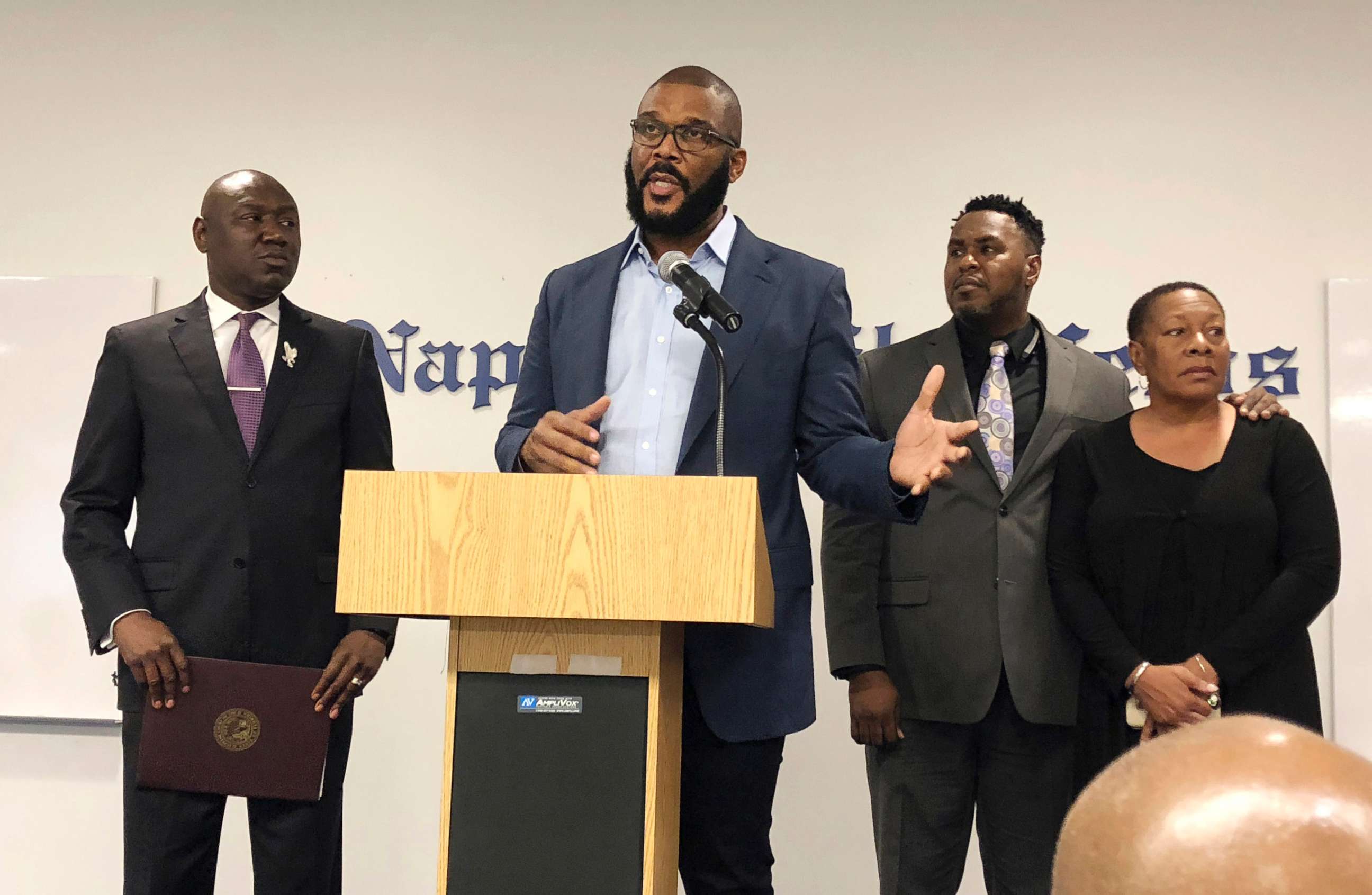 PHOTO: Filmmaker Tyler Perry, center, speaks to a a press conference announcing a lawsuit against former Collier County Sheriff's Deputy Steven Calkins, Sept. 4, 2018 in Naples, Fla.