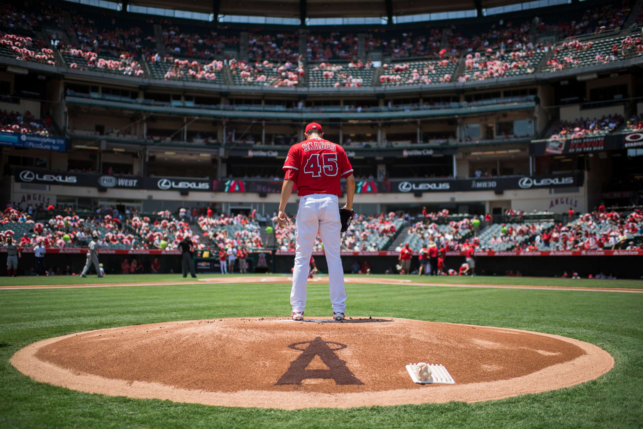 Fans gather outside Angel Stadium to mourn death of Tyler Skaggs