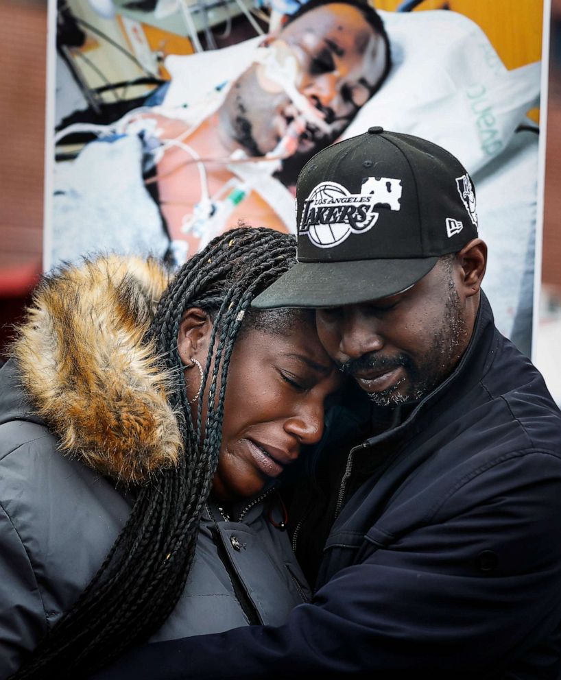 PHOTO: Kenyana Dixon is comforted during a rally for her brother, Tyre Nichols, at the National Civil Rights Museum in Memphis, Tenn., Jan. 16, 2023.