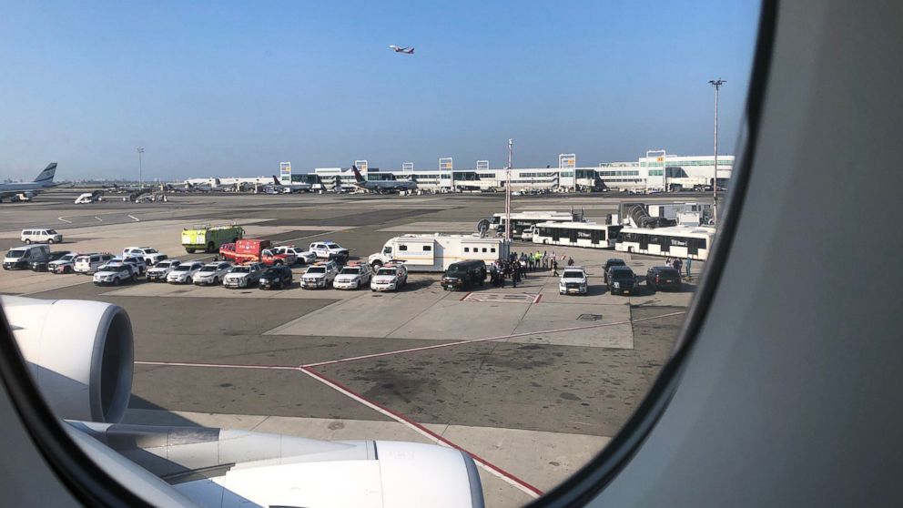 PHOTO: First responders are gathered on the tarmac in a photo shared by passenger on board a United Emirates flight that landed at JFK airport in New York with possible sick passengers on board, Sept. 5, 2018.