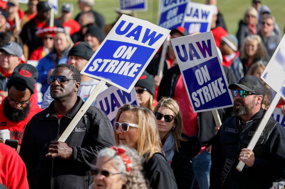 PHOTO: United Auto Workers union members and their families rally near the General Motors Flint Assembly plant on Solidarity, Oct. 13, 2019, in Flint, Mich.