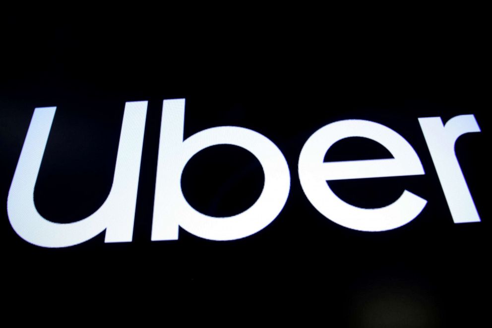 PHOTO: A screen displays the company logo for Uber Technologies Inc. on the day of it's IPO at the New York Stock Exchange (NYSE) in New York on May 10, 2019.