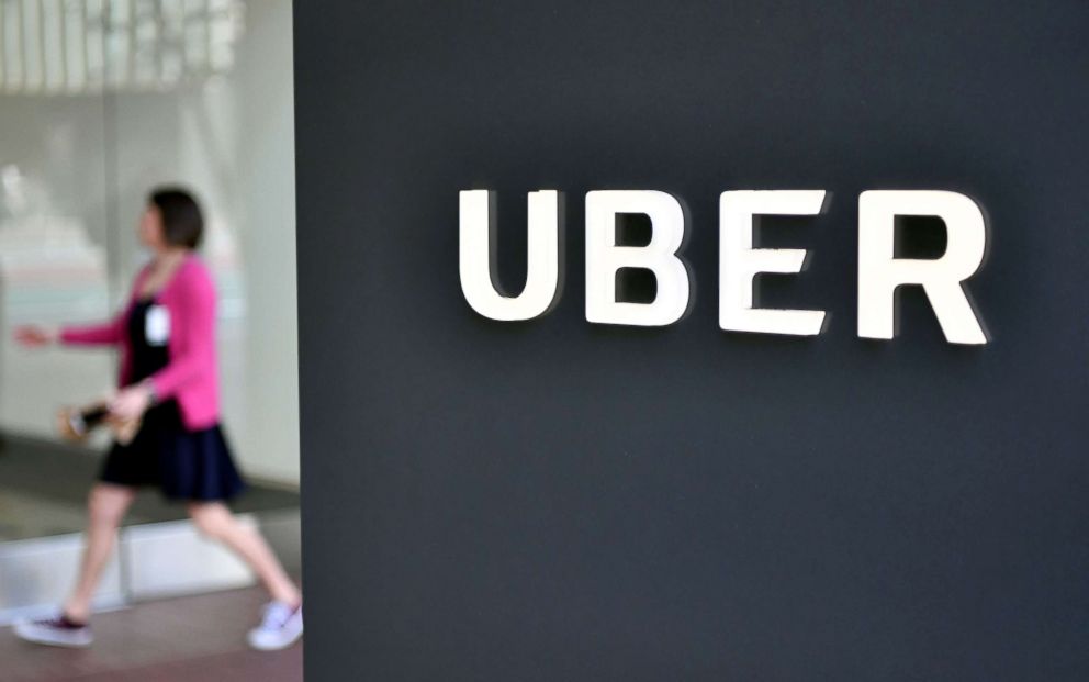 PHOTO: A woman walks into the Uber Corporate Headquarters building in San Francisco, Calif., Feb. 5, 2018.