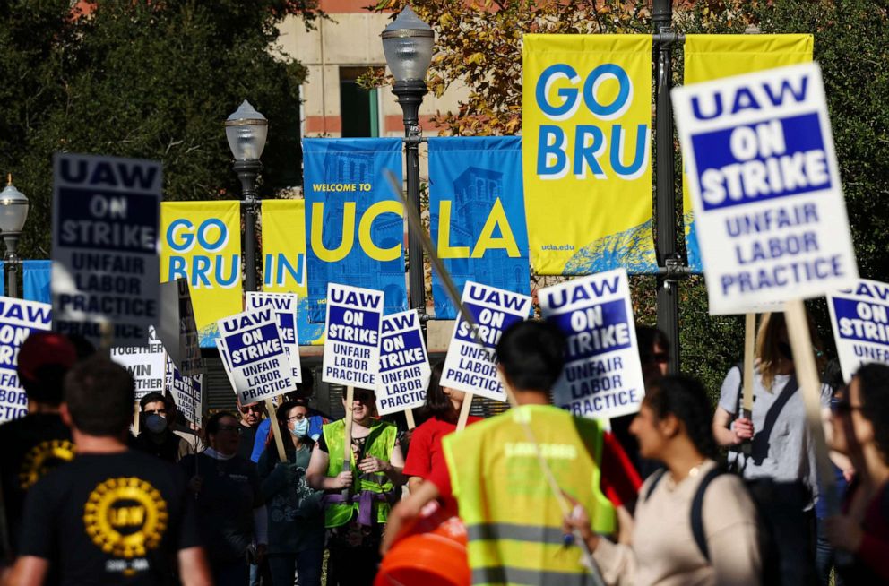 PHOTO: In this Nov. 15, 2022, file photo, academics and union supporters march and demonstrate on the UCLA campus in Los Angeles amid a statewide strike of nearly 48 000 unionized workers from the University of California.