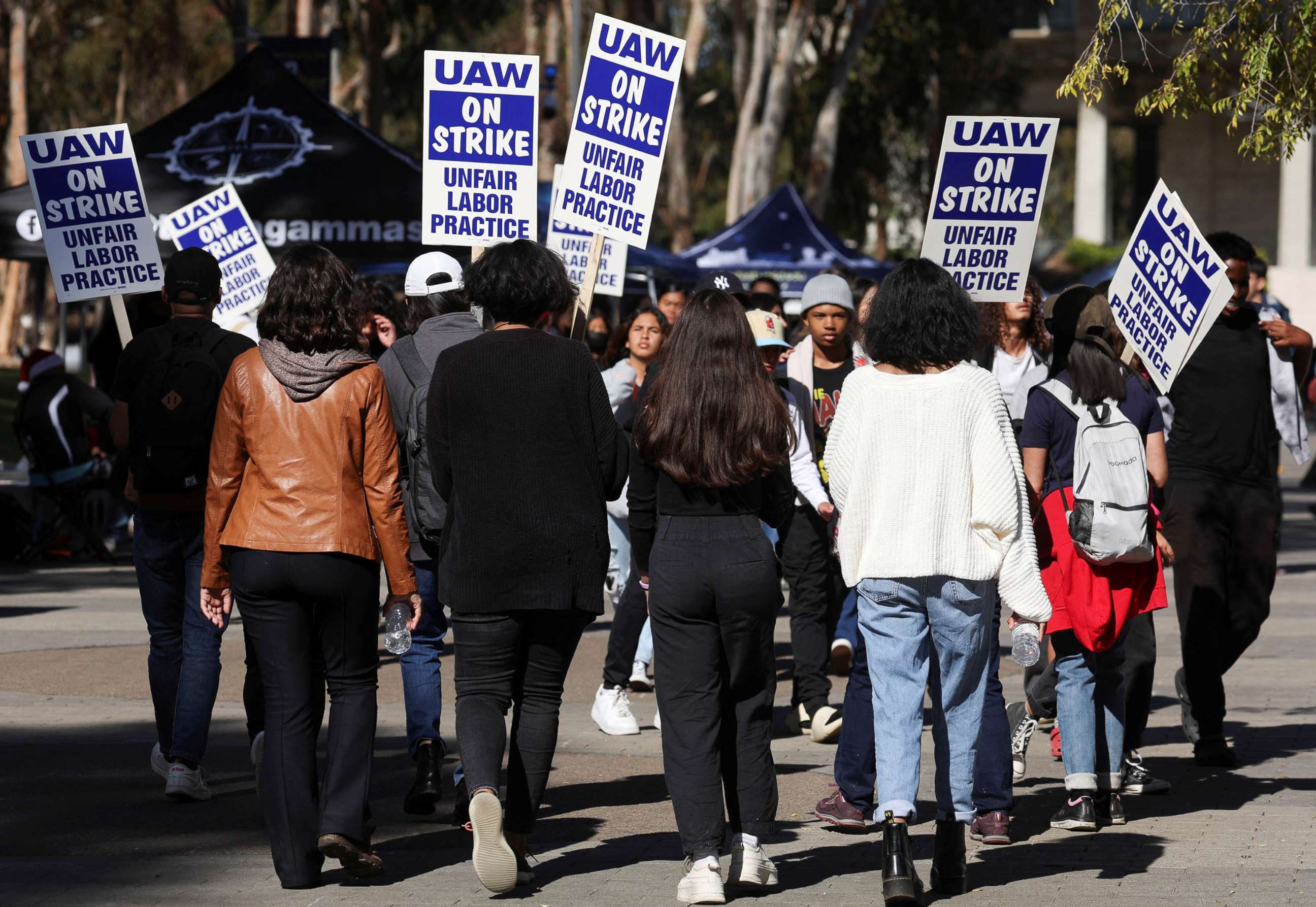 PHOTO: Academic workers at UC San Diego walk out as thousands of employees at the University of California campuses have gone on strike in an effort to secure improved pay and working conditions, Nov. 14, 2022 in San Diego.