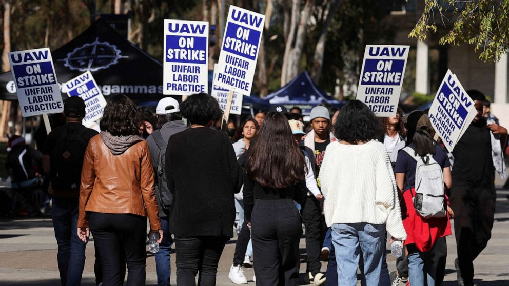 PHOTO: Academic workers at UC San Diego walk out as thousands of employees at the University of California campuses have gone on strike in an effort to secure improved pay and working conditions, Nov. 14, 2022 in San Diego.