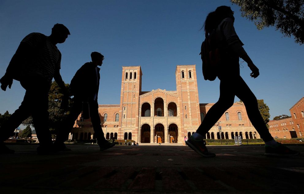 PHOTO: Students walk past Royce Hall on the campus of UCLA, Nov. 17, 2021, in Los Angeles.
