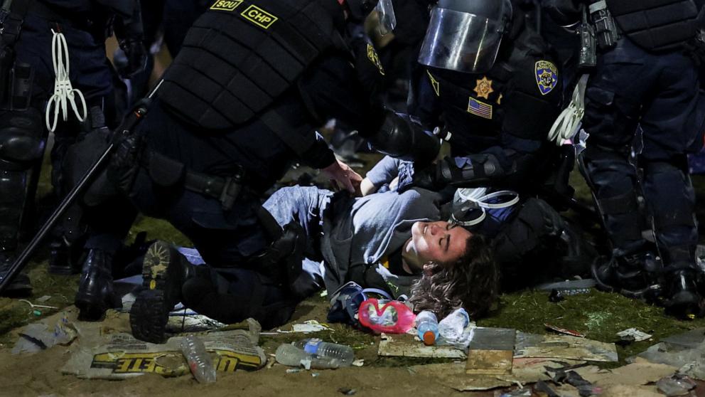 PHOTO: Law enforcement officers detain a protester at the University of California Los Angeles in Los Angeles, California, May 2, 2024.