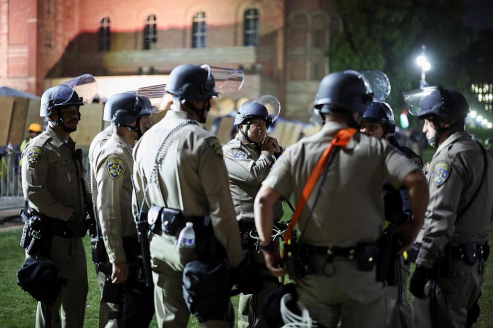 PHOTO: Law enforcement officers gather before entering the pro-Palestinian protest encampment at the University of California Los Angeles, California, U.S., May 1, 2024.