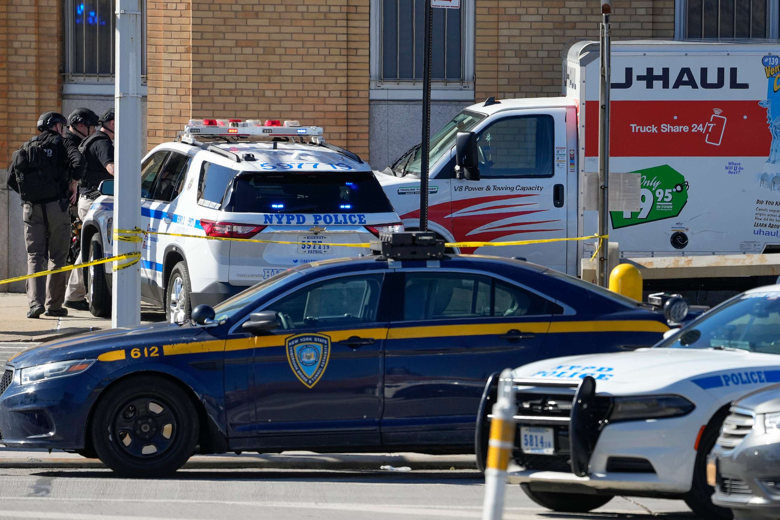 PHOTO: Members of the NYPD bomb squad pause before approaching a rental truck that was stopped and the driver arrested, Feb. 13, 2023, in New York.